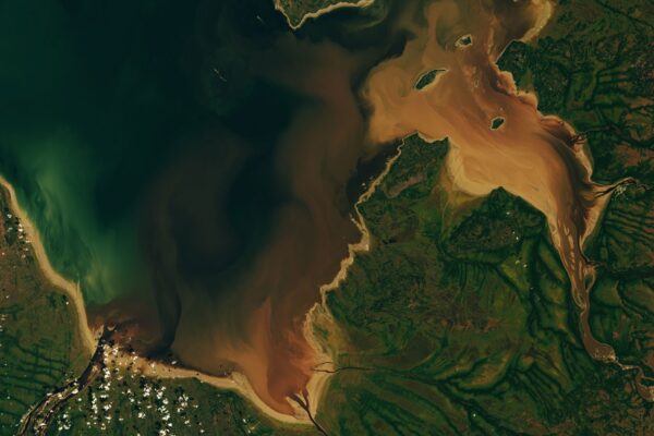 The Beaver Brown waters flow through Rupert Bay